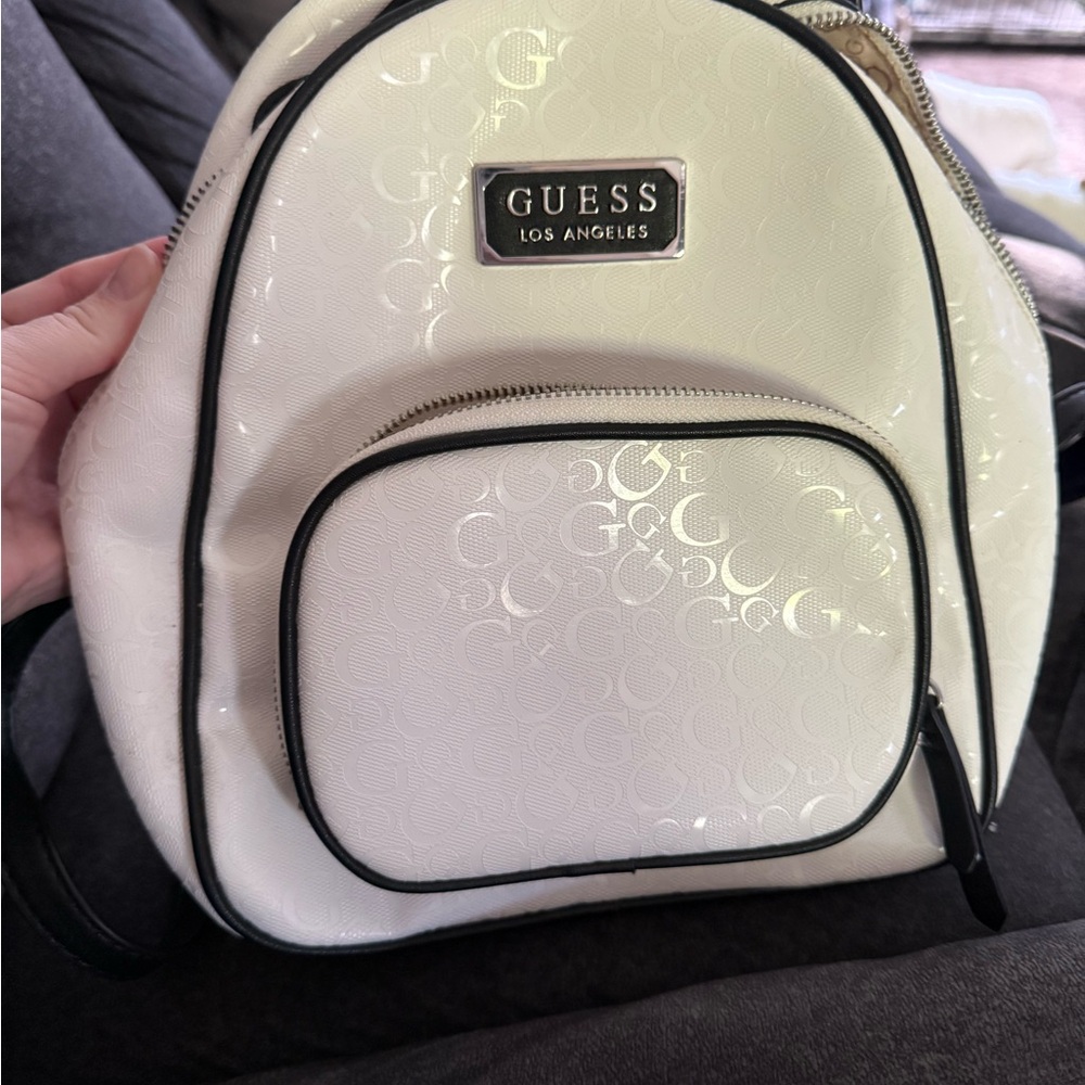 GUESS white and black mini backpack. Used once. Excellent condition.